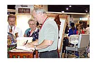 Paul Murphy signing books at Christian Booksellers Association in Atlanta
