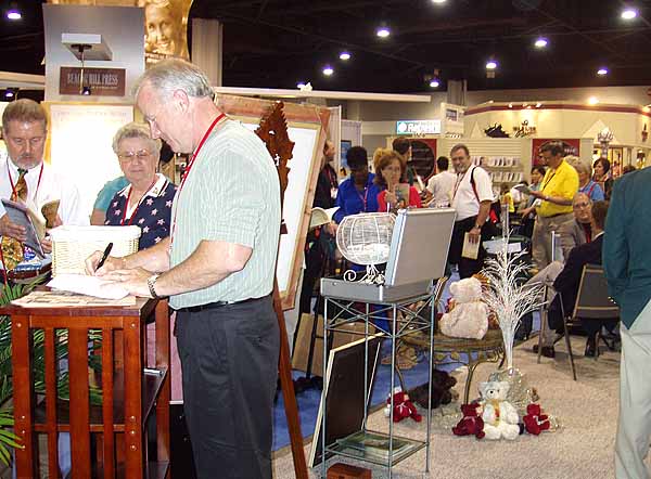 Paul Murphy signing books at Christian Booksellers Association in Atlanta - July 2004.